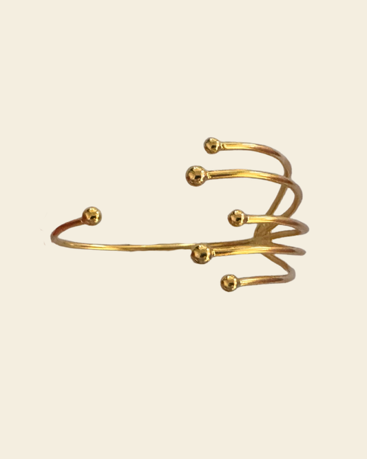Sol Cuff 
Handcrafted bronze accessory with 24K gold plating

A tribute to the sun, designed to radiate warmth and energy

Part of our El Dorado collection

Show your style with Sol and tag us @bokdi.eu!